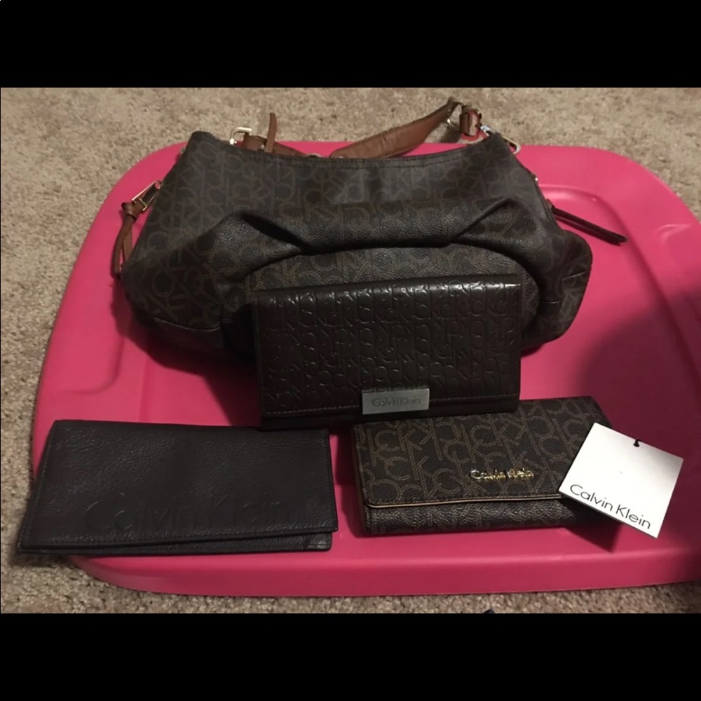 Calvin Klein purse and 2 wallets